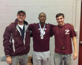 Malik Crossdale '14, back with coaches following his historic quarter mile